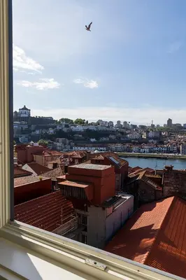 a view of a city from the window of a building at Infante Douro View in Porto