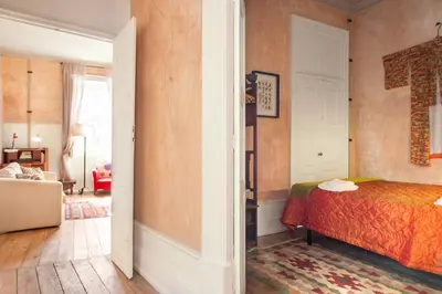a bedroom with a bed and a living room at VIVA Fabulous Old World in Porto