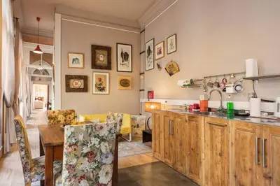 a kitchen and dining room with a table and chairs at VIVA Fabulous Old World in Porto
