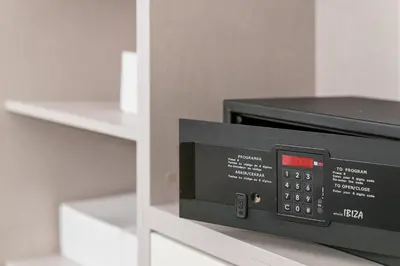 a microwave oven sitting on top of a shelf at GuestReady - Bourse Apartments in Porto