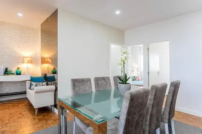 a dining room with a glass table and chairs at Casa D'Ouro Apartment by Oporto Soul in Porto