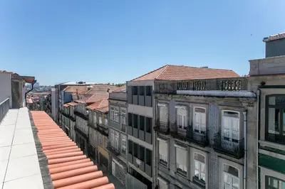 a row of old buildings in a city at Luminous Premium Loft w/AC & Terrace by LovelyStay in Porto