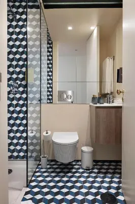 a bathroom with a shower and a toilet and a sink at Ribeira Trendy Flat in Medieval Mercadores Street in Porto