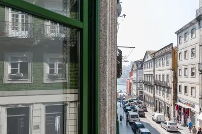 a view of a city street from a window at GuestReady - Mezuzah Green in Porto