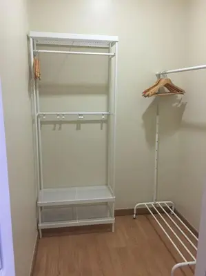 a glass refrigerator in a room with a wooden floor at Porto à Vista in Vila Nova de Gaia