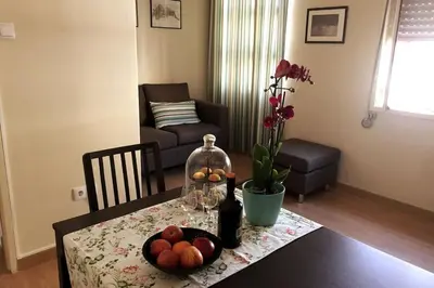 a dining room table with a bowl of fruit on it at Porto à Vista in Vila Nova de Gaia
