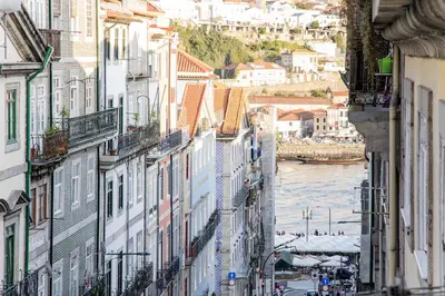 a view of a city with a river and buildings at Mouzinho Darling Studio w/ AC in City Center by LovelyStay in Porto