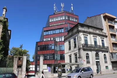 a tall building on the corner of a street at 3 Bedrooms Central Apartment with garage by Great&Cosy in Porto