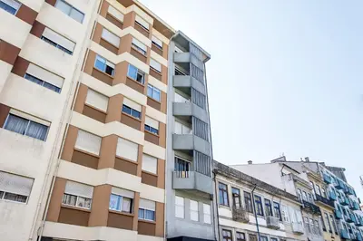 an apartment building in the city of paris at Elegant Studio w/ AC & Balcony by LovelyStay in Porto