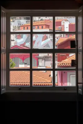 a view of a city from a window at HM - Infante Riverside Apartment R in Porto