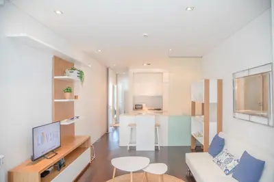 a living room with a couch and a table at Liiiving in Porto - Carlos Alberto Apartment in Porto