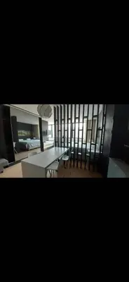a view of a living room with a table and chairs at 404 Galé Center Apartment wifi, parking in Porto