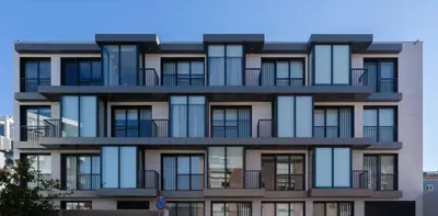 a building with balconies on the side of it at Habitatio - Bom Sucesso by LuxiStay in Porto