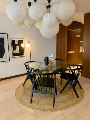 a glass table and chairs in a room with lights at Oporto Chic & Cozy - Oliveiras in Porto