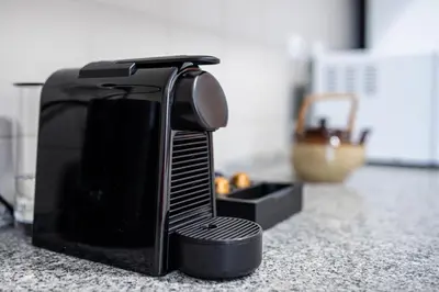 a hair dryer sitting on a counter top at Preciosa Apartment by MP in Vila Nova de Gaia