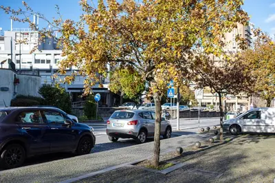 a group of cars parked in a parking lot at Preciosa Apartment by MP in Vila Nova de Gaia