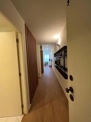 a hallway leading to a living room and a kitchen at bnapartments Cedofeita in Porto