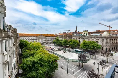 an overhead view of a city with buildings and trees at Liberty 119 • Luxurious 1BD in Porto's main Avenue in Porto