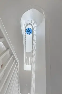 an archway in a church with a blue bow at InBloom Apartments 3 in Porto
