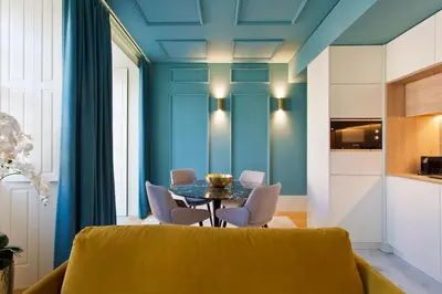 a dining room with blue ceilings and a table and chairs at BOUTIQUE Rentals-Kinga’s Ribeira River great views in Porto