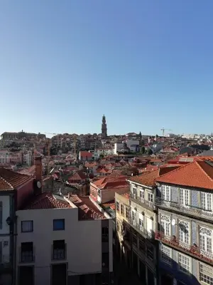 a view of a city with buildings and roofs at Luxury Prime Batalha Apartments in Porto
