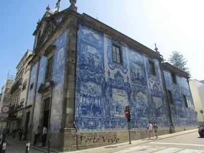 a building with a blue mural on the side of it at PortoVivo Quental Terrace in Porto