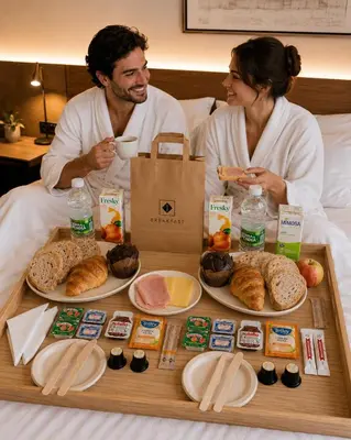 a bedroom with a large bed and a window at MyStay Porto São Bento in Porto