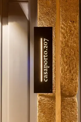 a laundry room with two washing machines in it at Panoramic Historic Views Private Balconies - Apt E in Porto