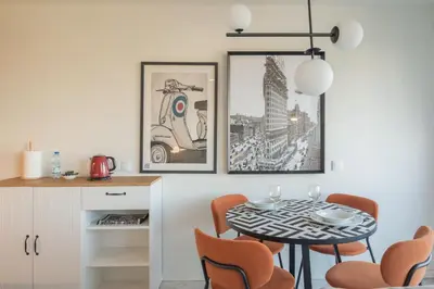 a dining room with a table and chairs at Liiiving in Porto - Luxury Gallery Apartment II in Porto
