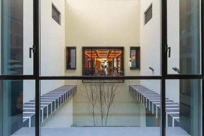 a view from the window of the lobby of a building at The Editory Boulevard Aliados Hotel - Preferred Hotels in Porto