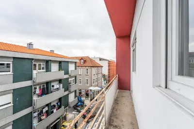 an apartment balcony with a view of buildings at Nomad's Sunny Firmeza - 2BED Porto in Porto