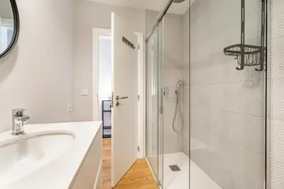 a bathroom with a shower and a sink at Nomad's Sunny Firmeza - 2BED Porto in Porto