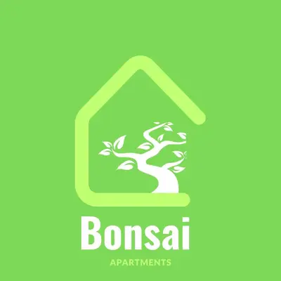 a tree in a house logo at Bonsai Apartment II in Porto