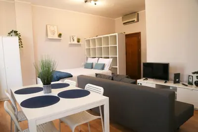 a living room with a couch and a table at Bonsai Apartment II in Porto