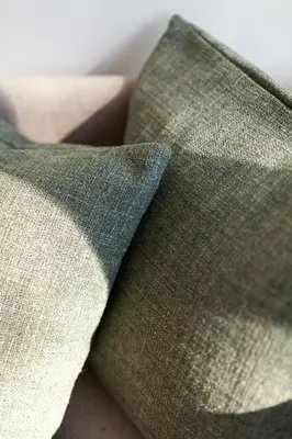 a close up of a green tie on a couch at VIVA Whilom Secret with garage in Porto