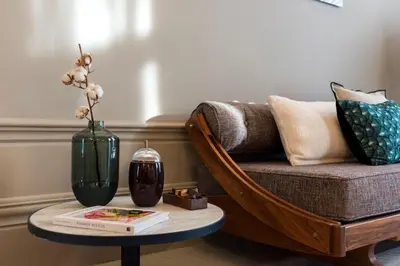 a bathroom with a sink and a toilet and a mirror at Jardins do Porto - by Unlock Hotels in Porto