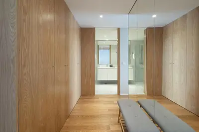 a room with a bench and a glass wall at Host Wise - Peaceful & Luxurious Flat - Terrace in Vila Nova de Gaia