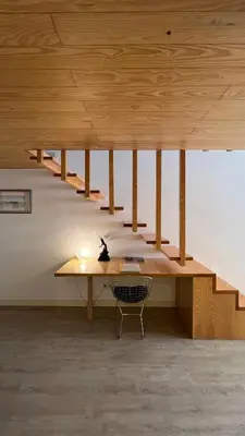a desk in a room with a wooden ceiling at Porto Legend Apartments in Porto