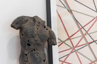 a statue of a dog next to a wall at GuestReady - Chakra Duplex in Porto