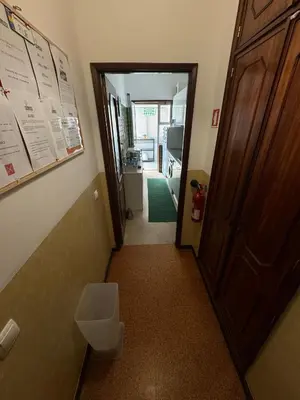 a hallway with a toilet in a room at Pilar Hostel - Rua de Santa Catarina - Porto in Porto