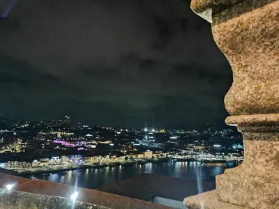 a view of a city at night at Vérités Dame in Porto