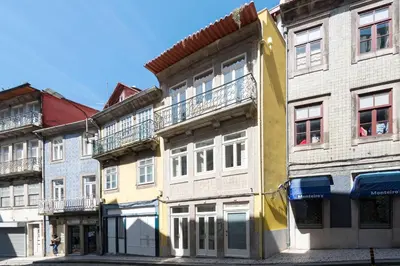 a group of buildings on a city street at Central Superb Flat w/ AC & Balcony by LovelyStay in Porto