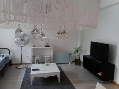a living room with a couch and a table at KrisApartments 2 in Porto