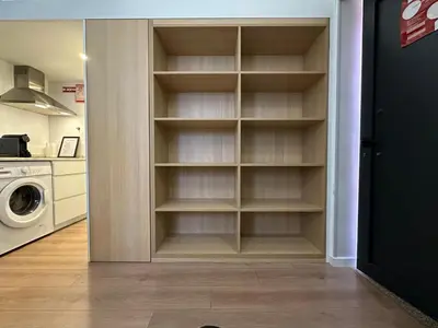 a closet with empty shelves in a kitchen at FIVE HOUSE 16 in Porto