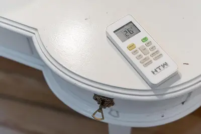 a remote control sitting on top of a scale at GuestReady - Modern Comfort in Downtown in Porto