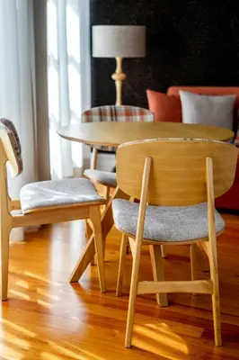a wooden table with chairs and a table and a table at Mouzinho 129 - Sobreiro in Porto