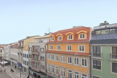 a group of buildings on a city street at FLH Porto Santa Catarina Duplex in Porto
