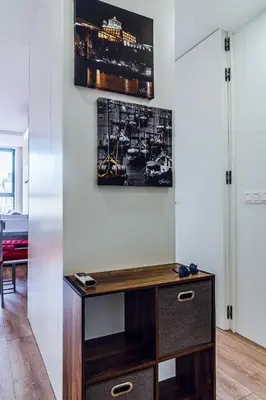 a room with a desk and a picture on the wall at Emotions Porto Flat in Porto