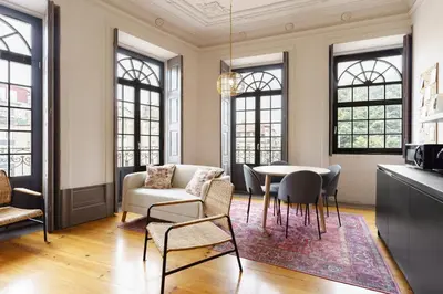 a living room with a couch and a table at Feel Porto Antique Poveiros Flats in Porto