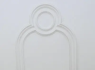 a white painting of a cross on a wall at Porto Republica Ribeira in Porto